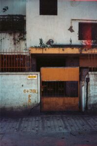 Vintage room filled with old electronics and a typewriter in a rustic setting