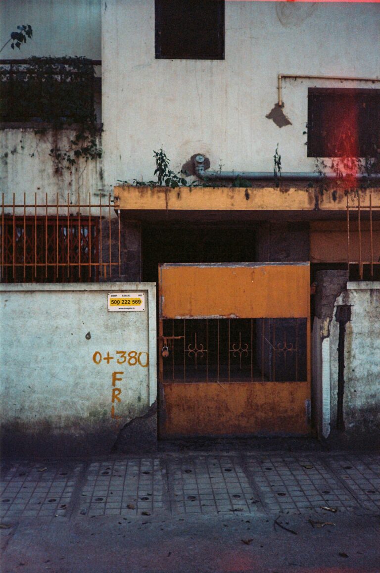 Vintage room filled with old electronics and a typewriter in a rustic setting