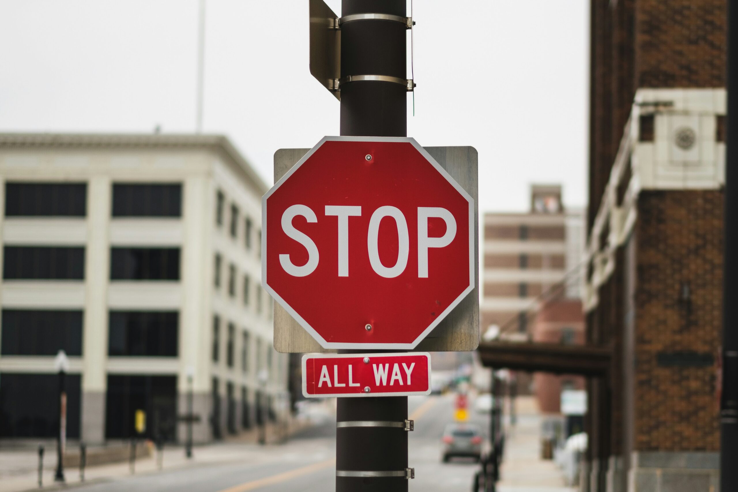 Stop sign on a clear day, symbolizing the need to pause and confront compromise and sin in the Christian life