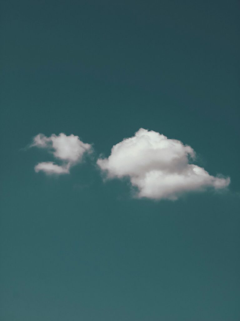 White clouds floating in a clear blue sky