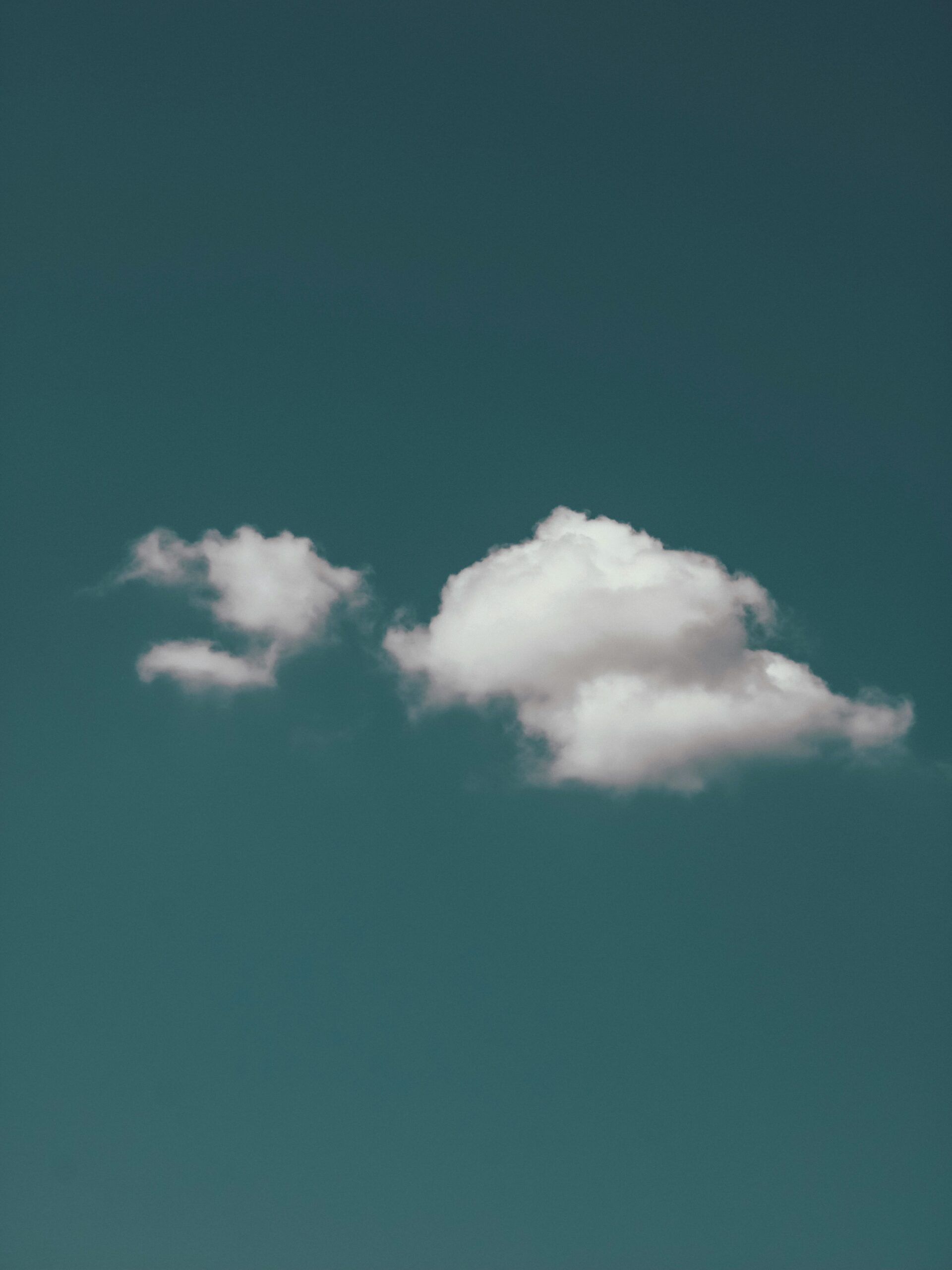 White clouds floating in a clear blue sky