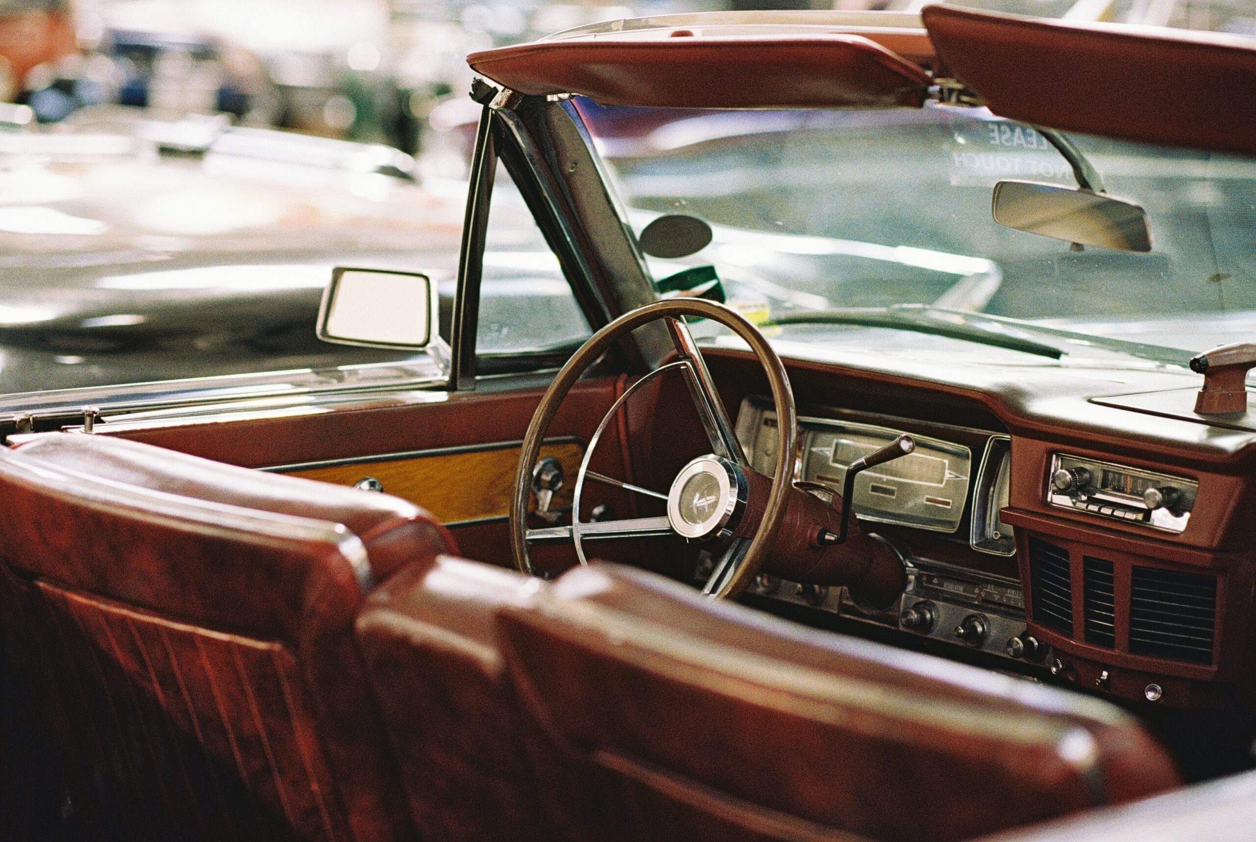Let's Talk About It Podcast - The Truth About Christian Dating: interior of a vintage convertible with brown leather seats